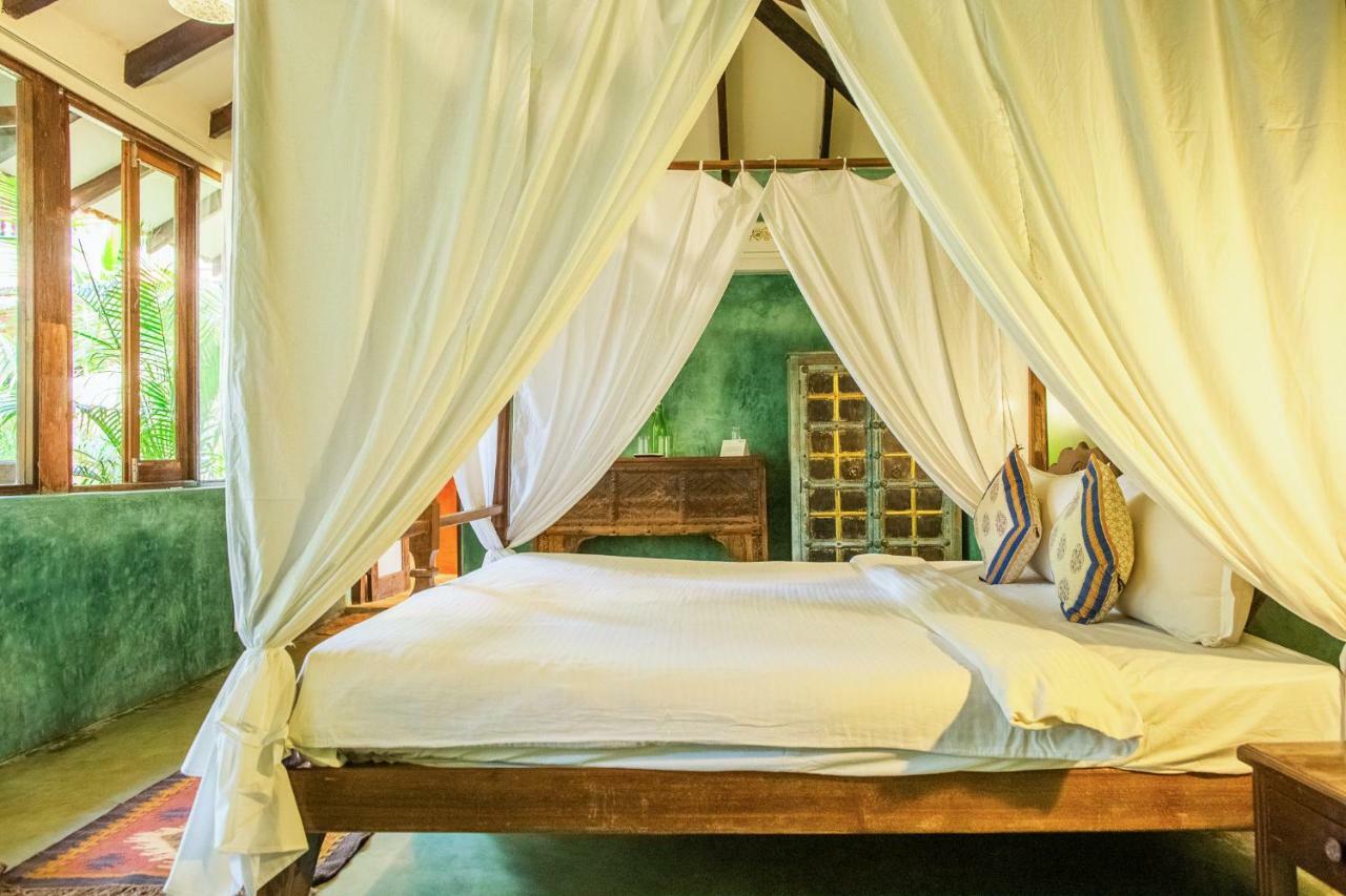 Devarya Wellness Beach Resort Morjim Quarto foto