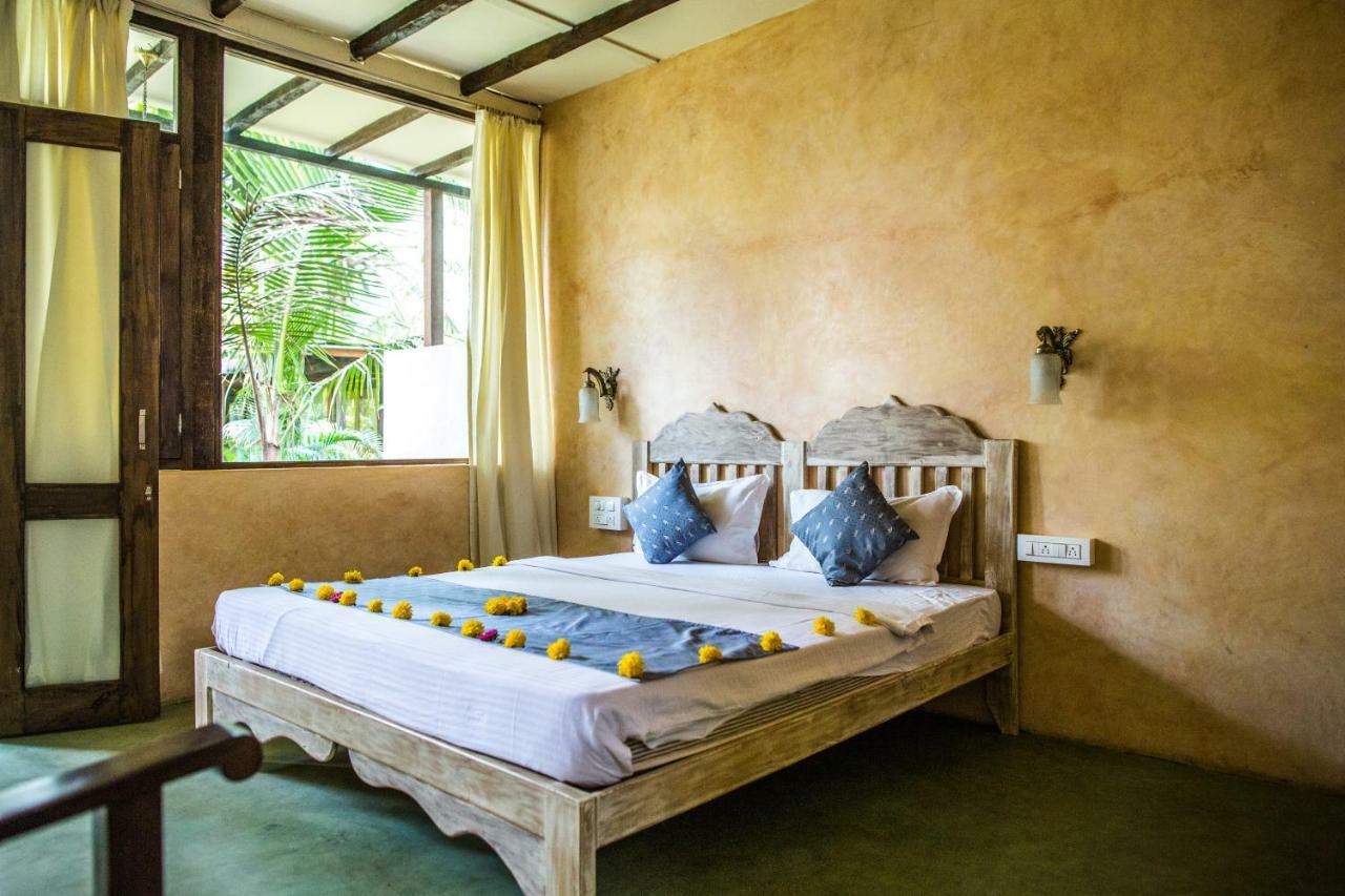 Devarya Wellness Beach Resort Morjim Quarto foto